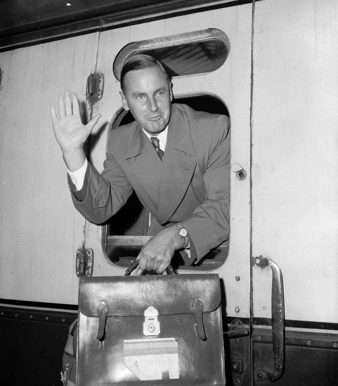 Peter May arrives back from South Africa, Waterloo station, London, March 29, 1957