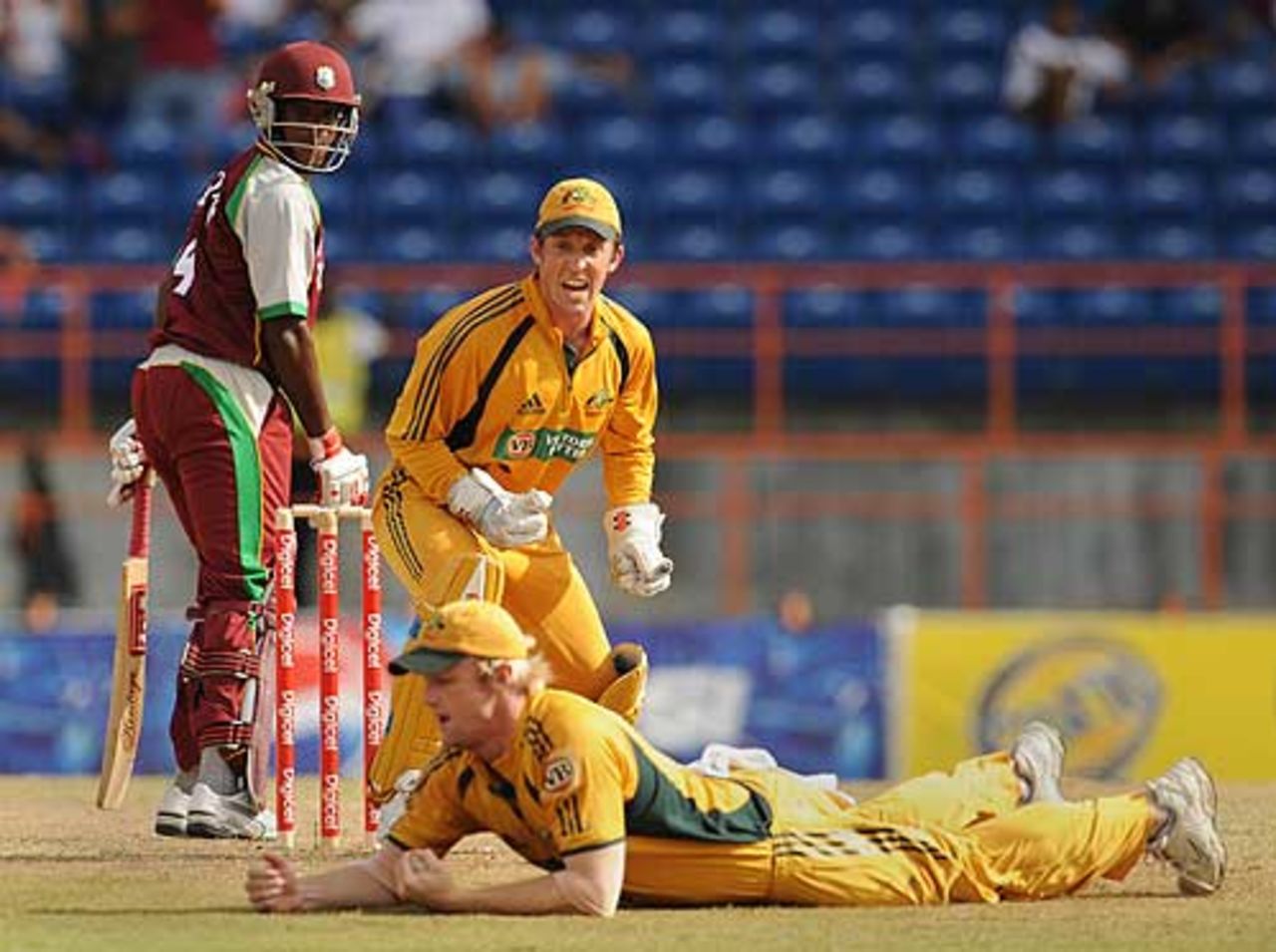 Patrick Browne and Luke Ronchi look on as Cameron White holds a good catch, West Indies v Australia, 2nd ODI, Grenada, June 27, 2008