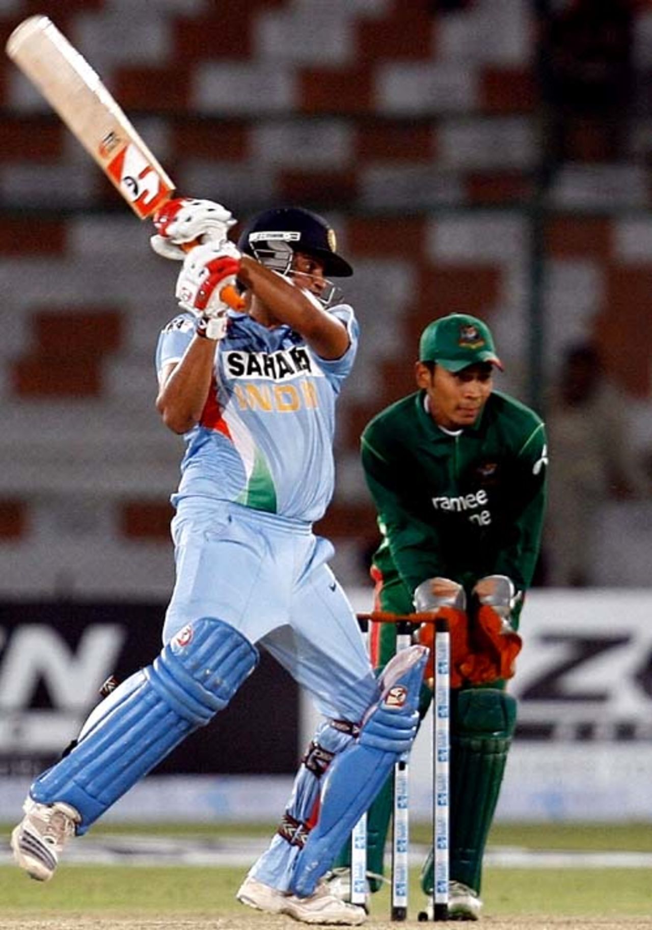 Suresh Raina sends the ball racing to the off side, Bangladesh v India, Super Four, Asia Cup, Karachi, June 28, 2008 