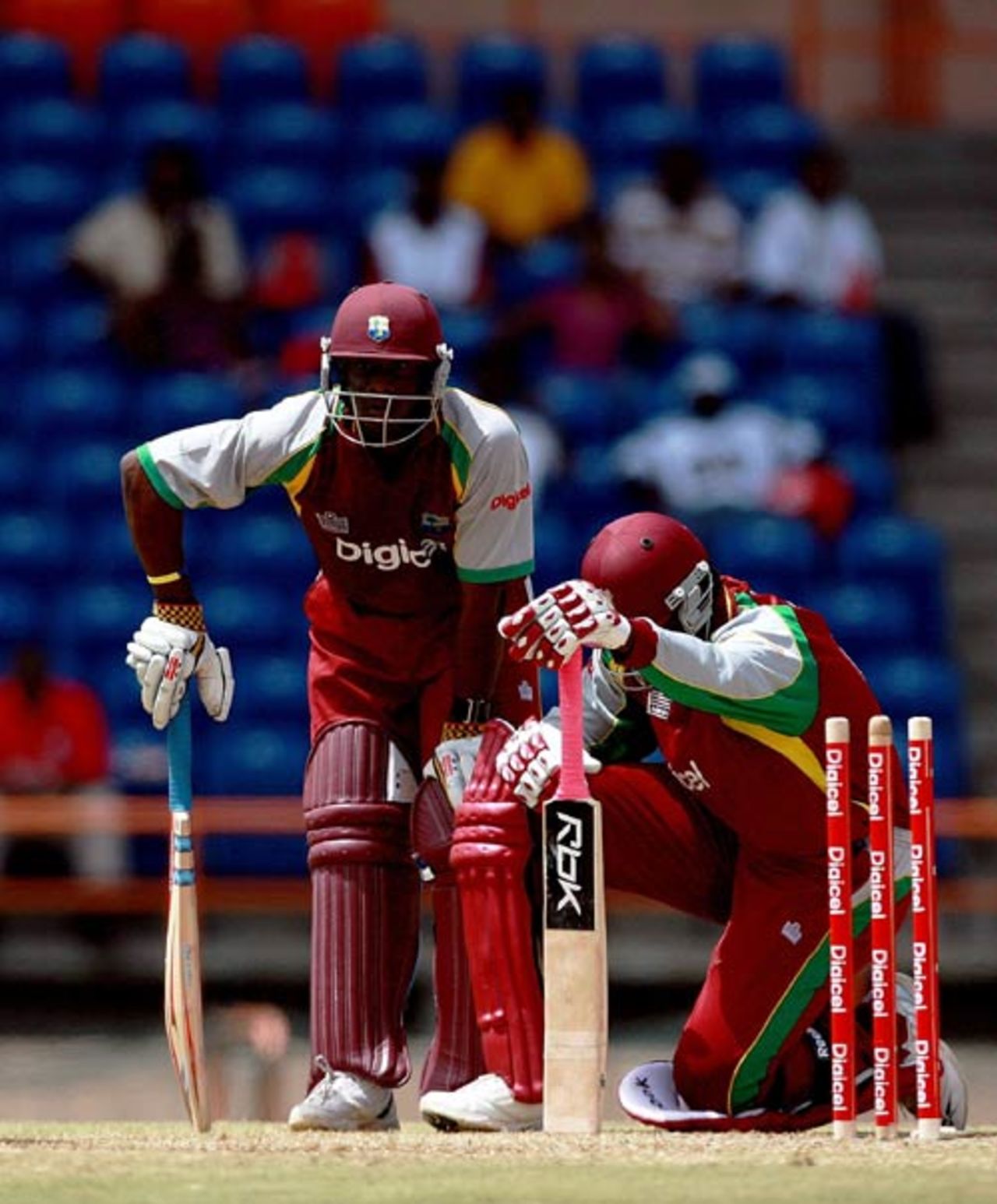 Xavier Marshall and Chris Gayle wait for the third umpire's decision, West Indies v Australia, 3rd ODI, Grenada, June 29, 2008