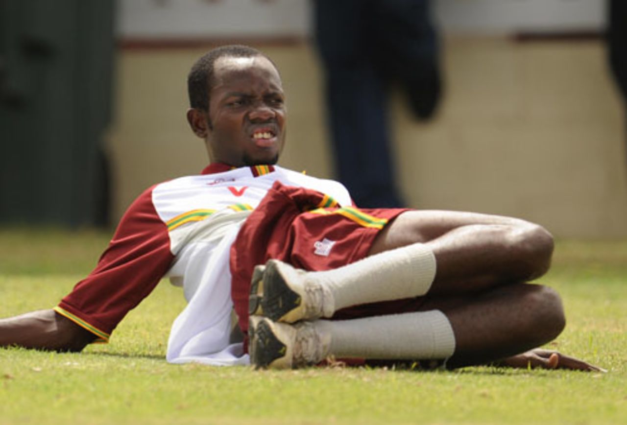 Nikita Miller stretches at West Indies' training session, St Kitts, July 2, 2008