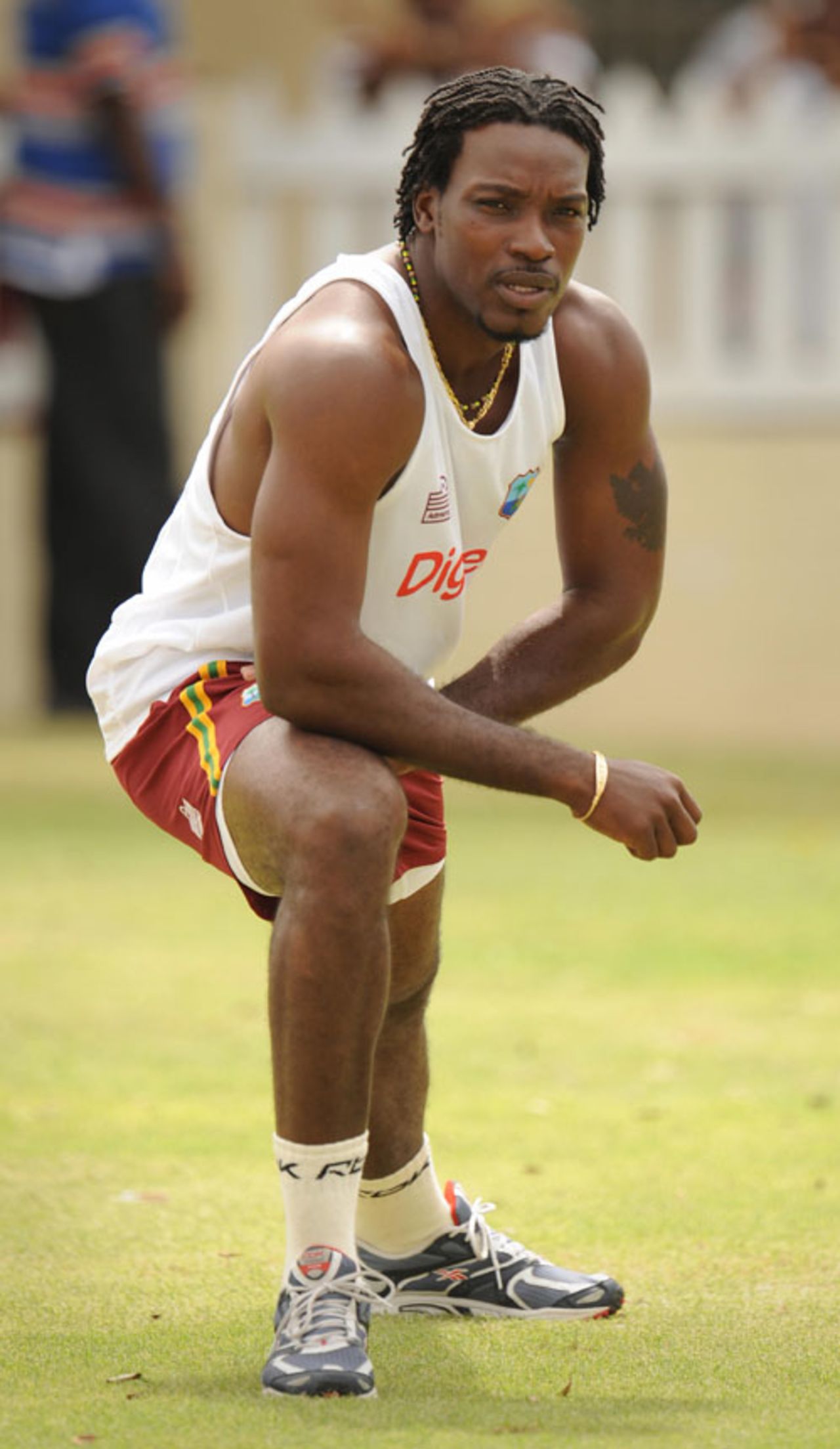Chris Gayle stretches at West Indies' training session, St Kitts, July 2, 2008