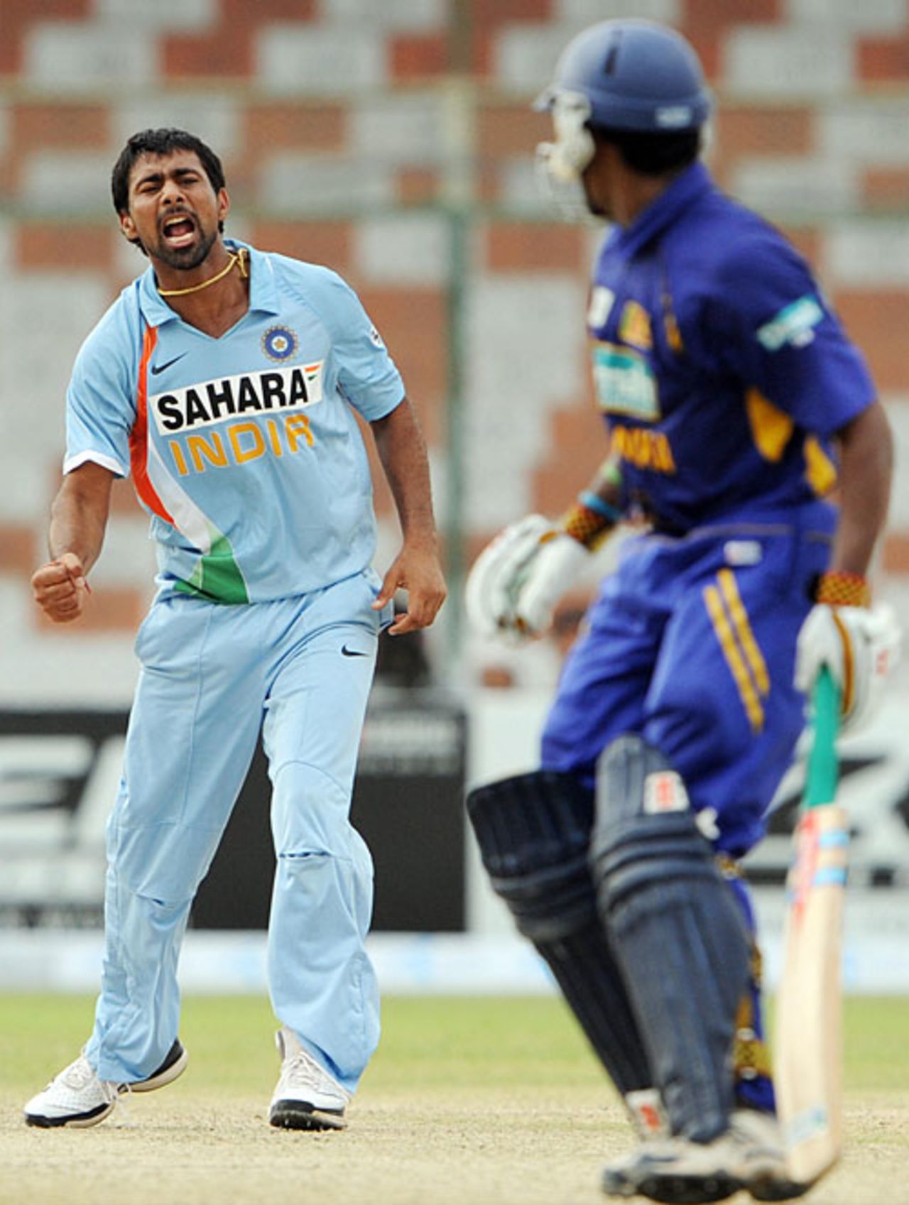 Praveen Kumar is pumped after dismissing Chamara Kapugedera, India v Sri Lanka, Super Four, Asia Cup, Karachi, July 3, 2008