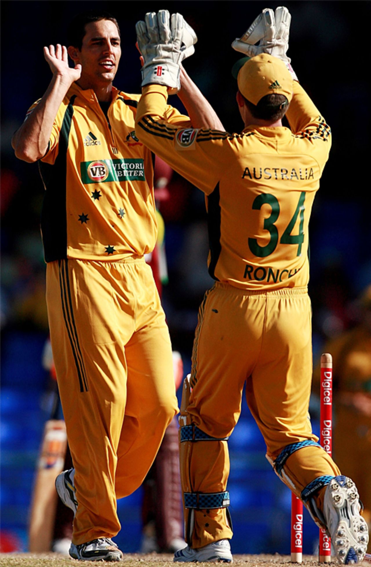 Luke Ronchi and Mitchell Johnson celebrate one of the bowler's five wickets, West Indies v Australia, 5th ODI, St Kitts, July 6, 2008