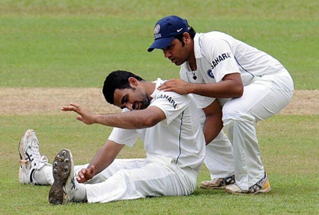 Rohit Sharma helps Zaheer Khan stretch, Sri Lanka Board XI v Indians, tour match, 1st day, July 18, 2008