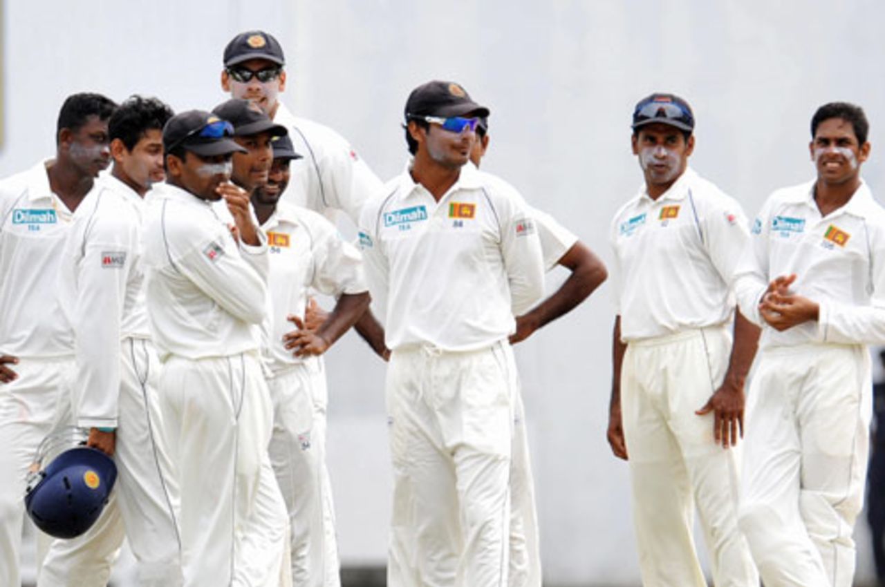 The Sri Lankan team wait after the batsman Anil Kumble asked for a referral, Sri Lanka v India, 1st Test, SSC, Colombo, 4th day, July 26, 2008