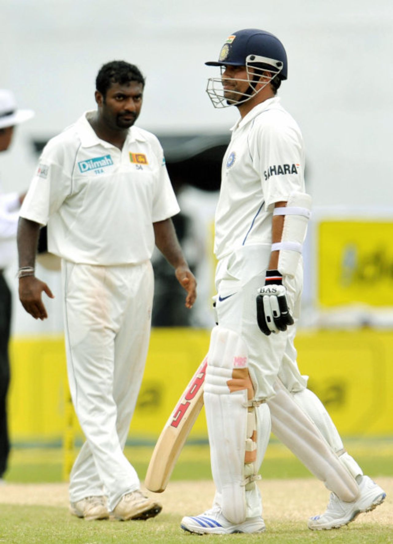 Muttiah Muralitharan and Sachin Tendulkar wait for the umpire's review of a bat-pad chance, Sri Lanka v India, 1st Test, SSC, Colombo, 4th day, July 26, 2008