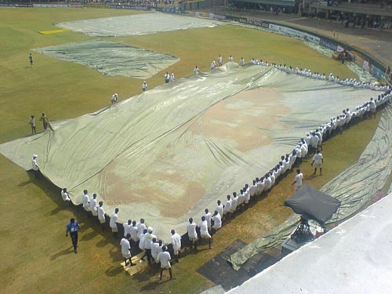 Covers come off after the rain interruption, Sri Lanka v India, 2nd Test, Galle, 1st day, July 31, 2008
