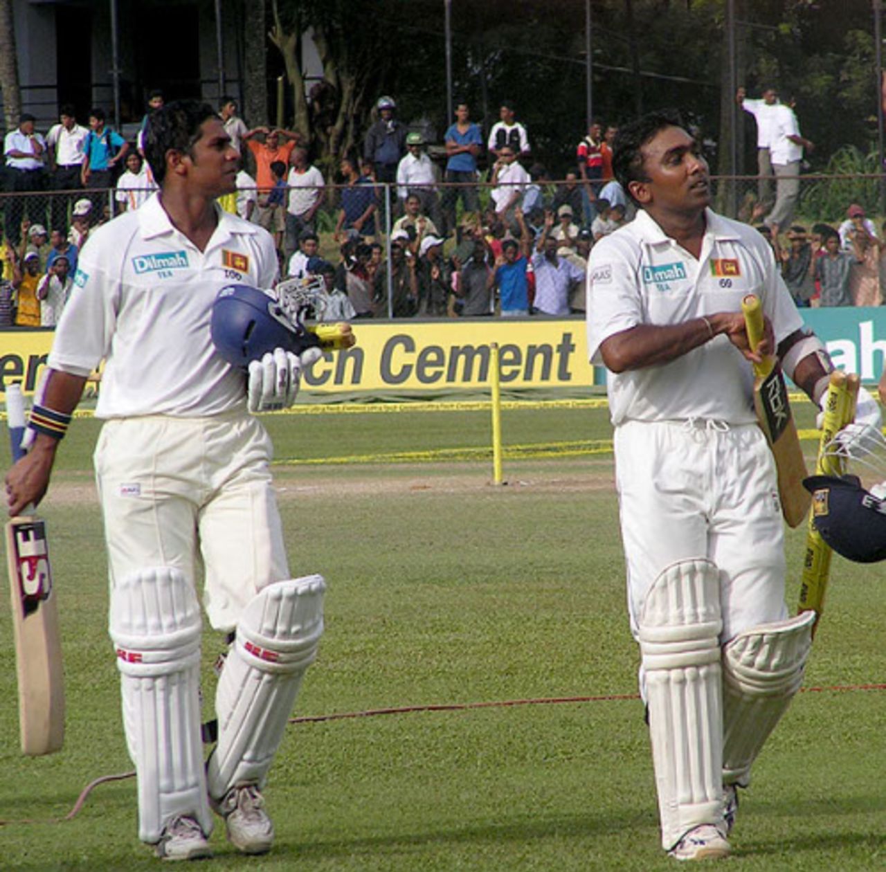 Malinda Warnapura and Mahela Jayawardene return to the pavilion after Sri Lanka's eight-wicket win, Sri Lanka v India, 3rd Test, PSS, Colombo, 4th day, August 11, 2008