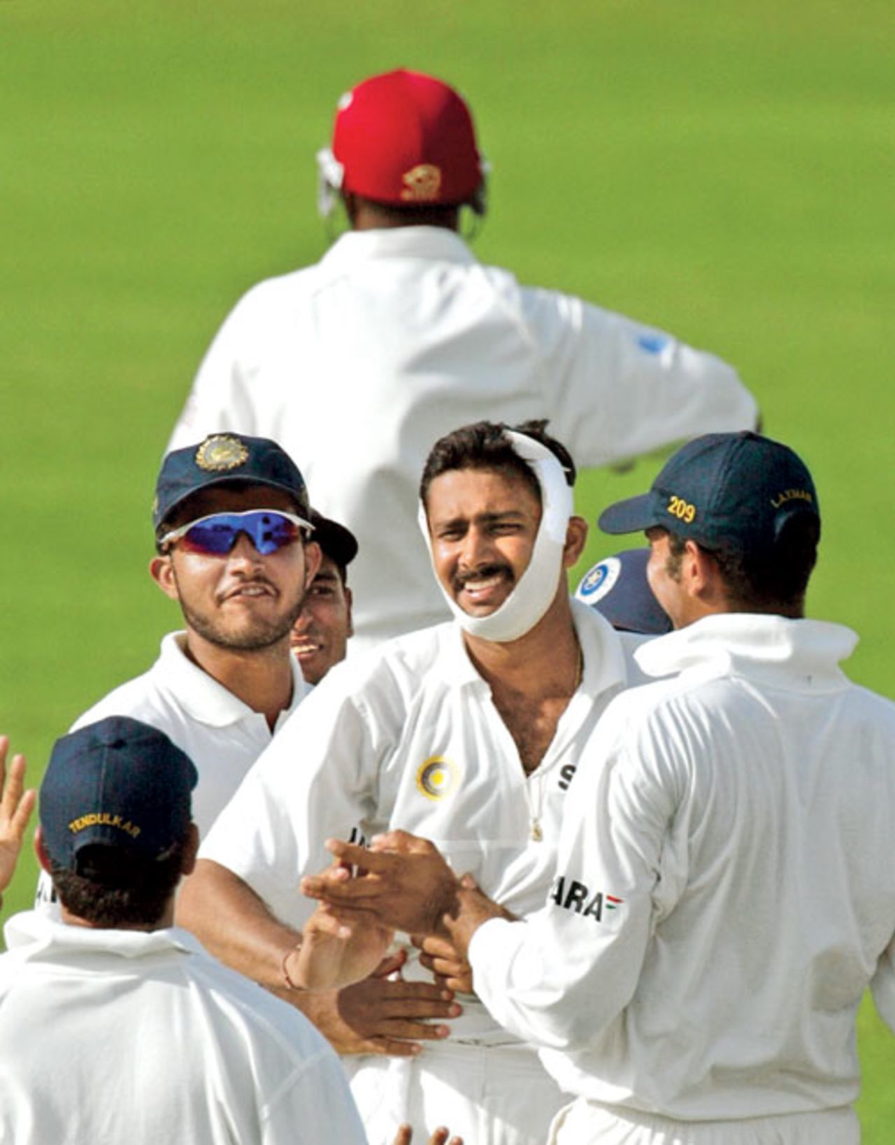 Anil Kumble bowls with a broken jaw and gets Brian Lara, West Indies v India, 4th Test, St John's, 12 May, 2002