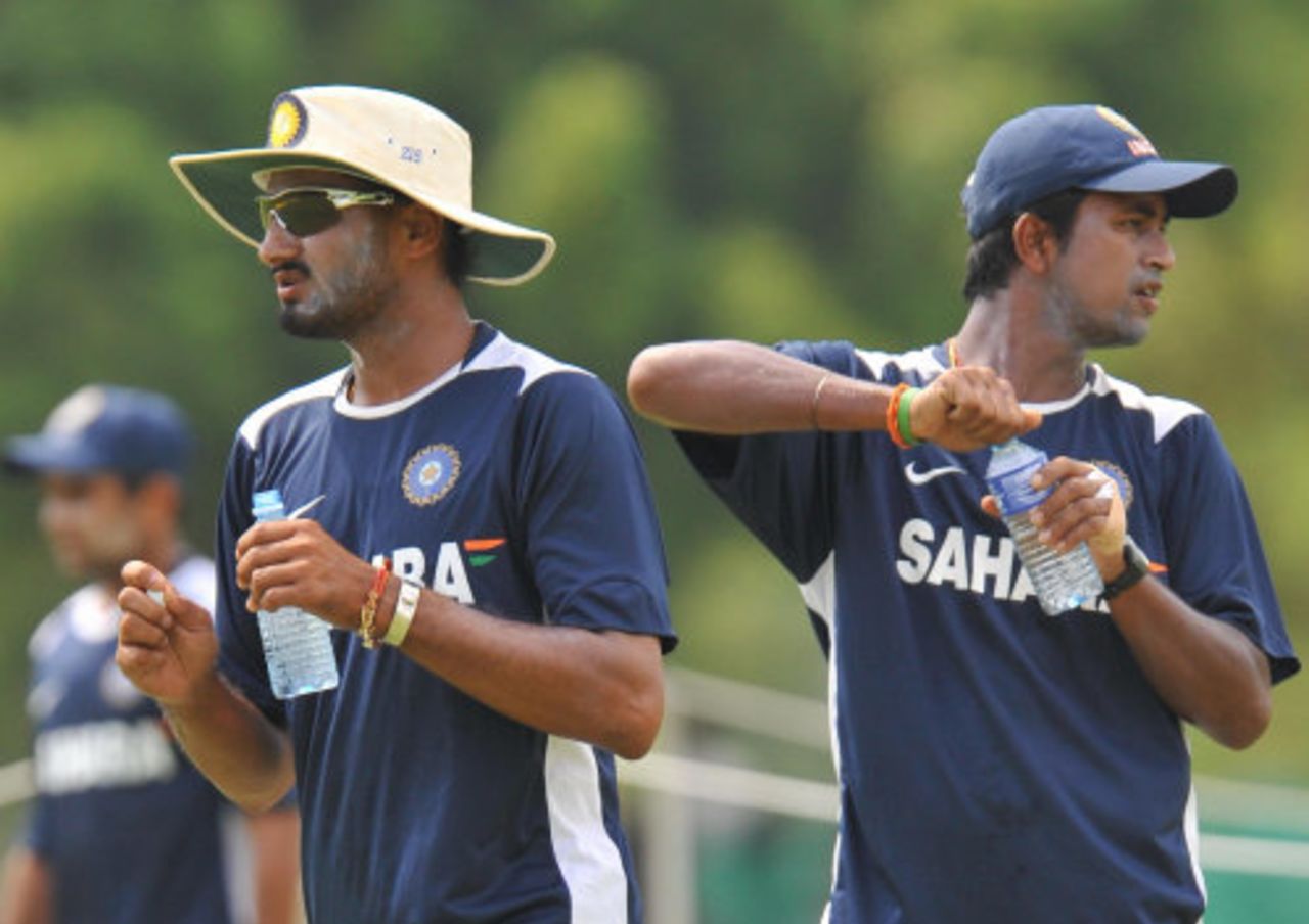 Harbhajan Singh and Pragyan Ojha take in the fluids, Dambulla, August 17, 2008 