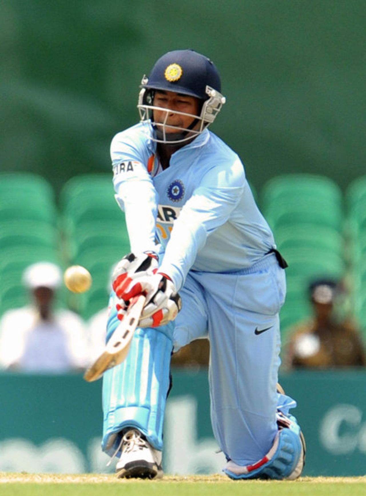 Pragyan Ojha sweeps the ball, Sri Lanka v India, 1st ODI, Dambulla, August 18, 2008 