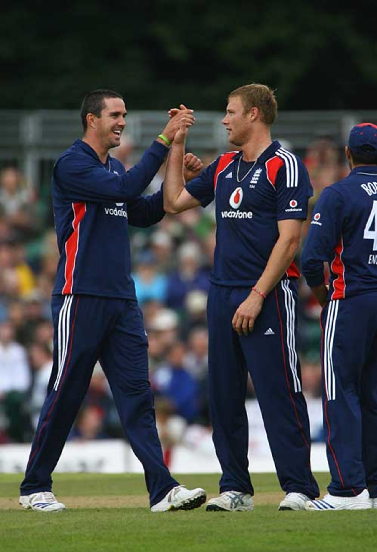 Kevin Pietersen high-fives with Andrew Flintoff after one of his three wickets, Scotland v England, The Grange, Edinburgh, August 18, 2008