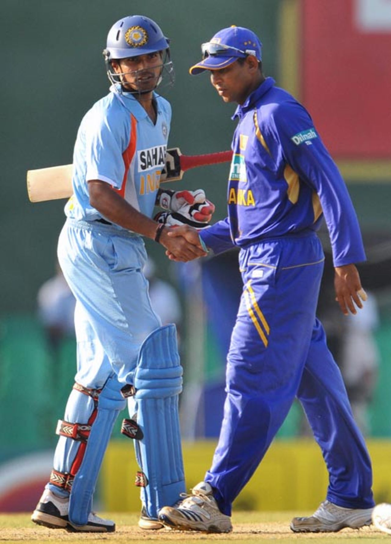 S Badrinath is congratulated by Tillakaratne Dilshan after the match, Sri Lanka v India, 2nd ODI, Dambulla, August 20, 2008