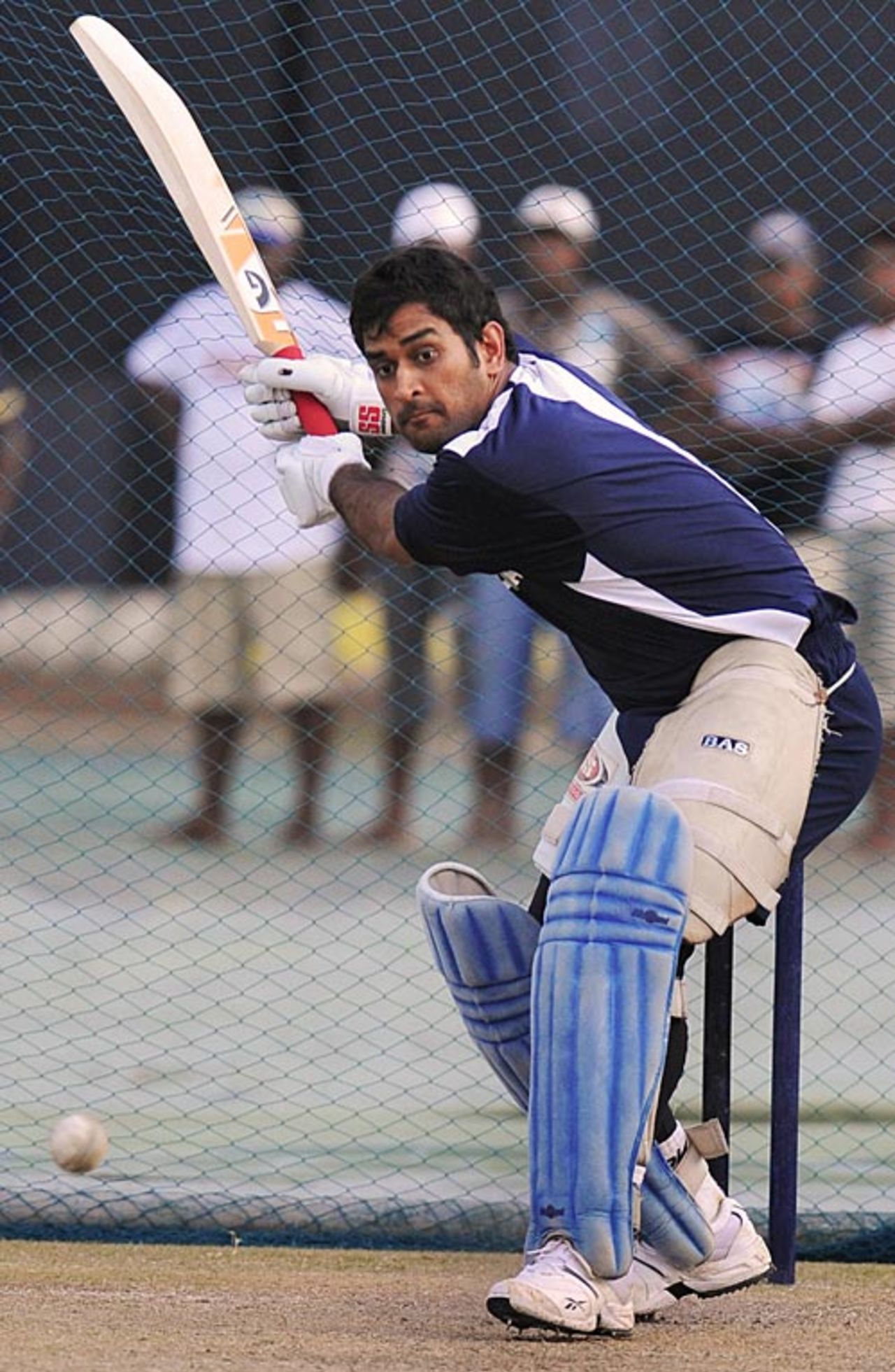 Mahendra Singh Dhoni winds up to smash it, Colombo, August 23, 2008