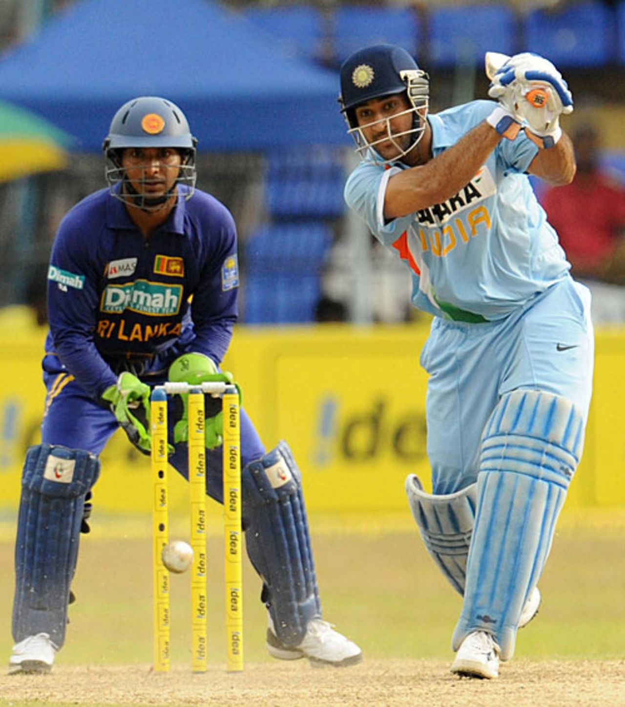 Mahendra Singh Dhoni sends the ball down the ground, Sri Lanka v India, 4th ODI, Colombo, August 27, 2008