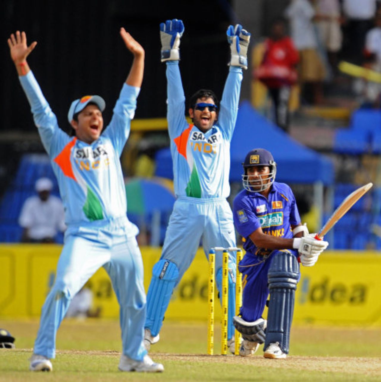 Suresh Raina and Mahendra Singh Dhoni make an unsuccessful lbw appeal against Mahela Jayawardene, Sri Lanka v India, 5th ODI, Colombo, August 29, 2008 
