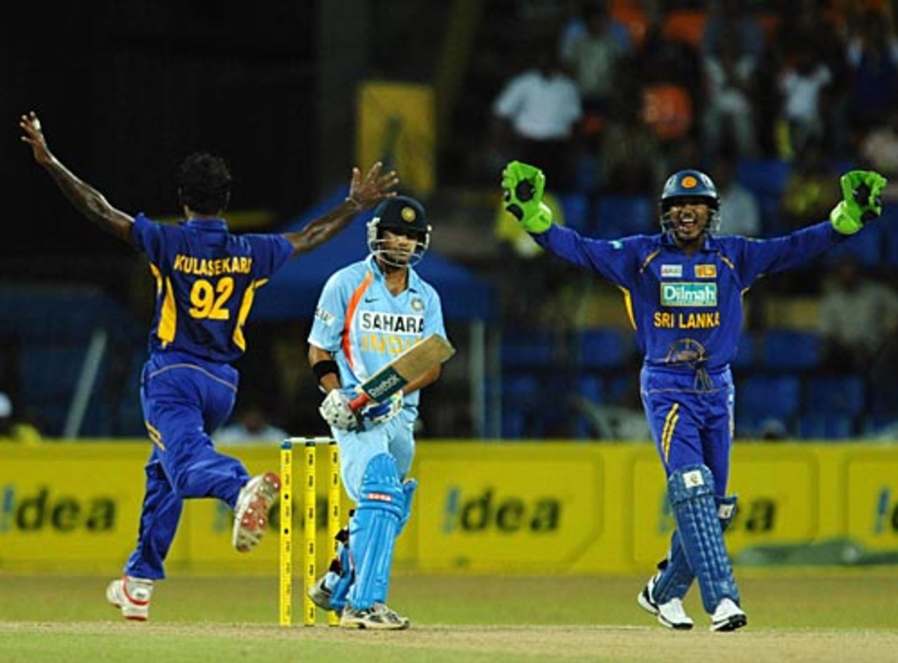 Sri Lankan players celebrate the fall of Gautam Gambhir's wicket, Sri Lanka v India, 5th ODI, Colombo, August 29, 2008 
