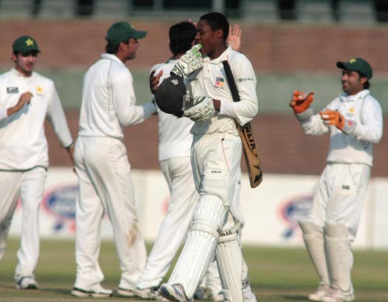 The Pakistan Academy celebrate the dismissal of Timycen Maruma, Zimbabwe Board XI v Pakistan Academy, second four-day match, Harare, 1st day, August 29, 2008
