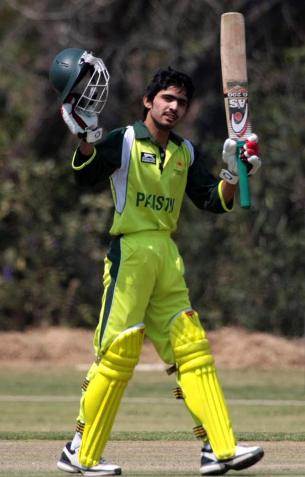 Fawad Alam raises his bat after reaching his hundred, Zimbabwe Board XI v Pakistan Cricket Academy , 3rd one-dayer, Harare, September 9, 2008