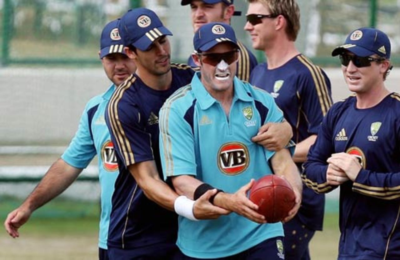 Michael Hussey and Mitchell Johnson get physical during a training session, Jaipur, September 24, 2008