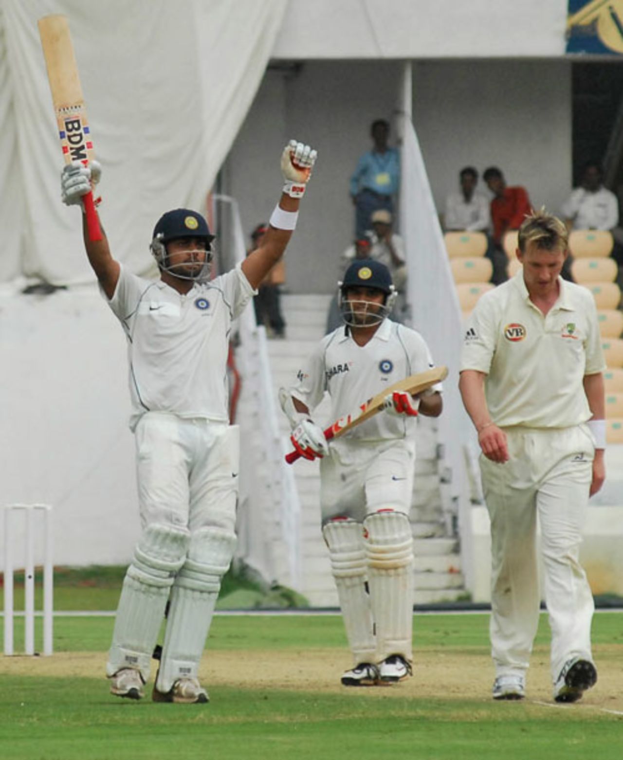 Virat Kohli raises his bat to celebrate his century, Indian Board President's XI v Australians, Hyderabad, October 2, 2008

