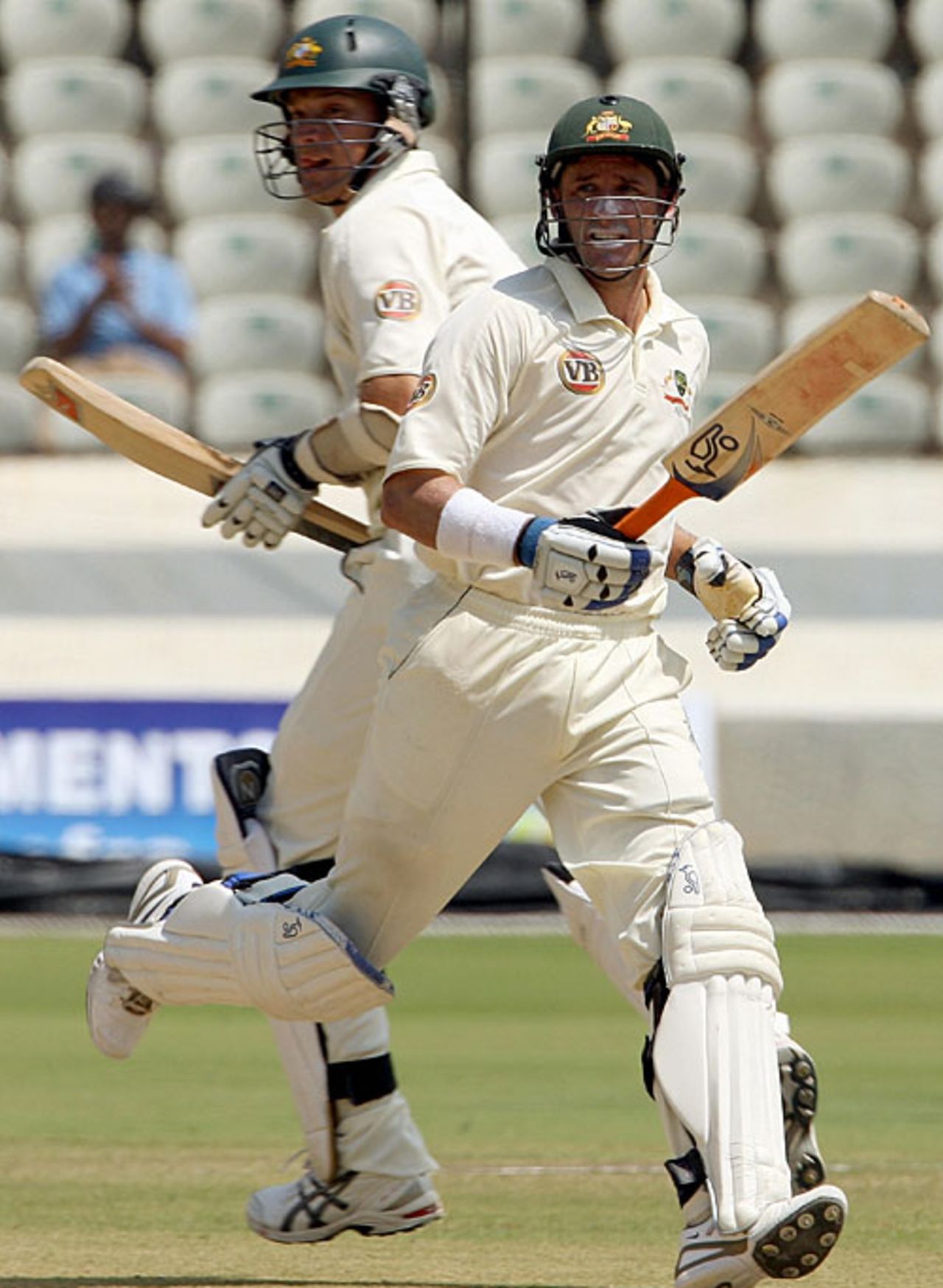 Michael Hussey and Stuart Clark run during their partnership of 96, Board President's XI v Australians, Hyderabad, 3rd day, October 4, 2008