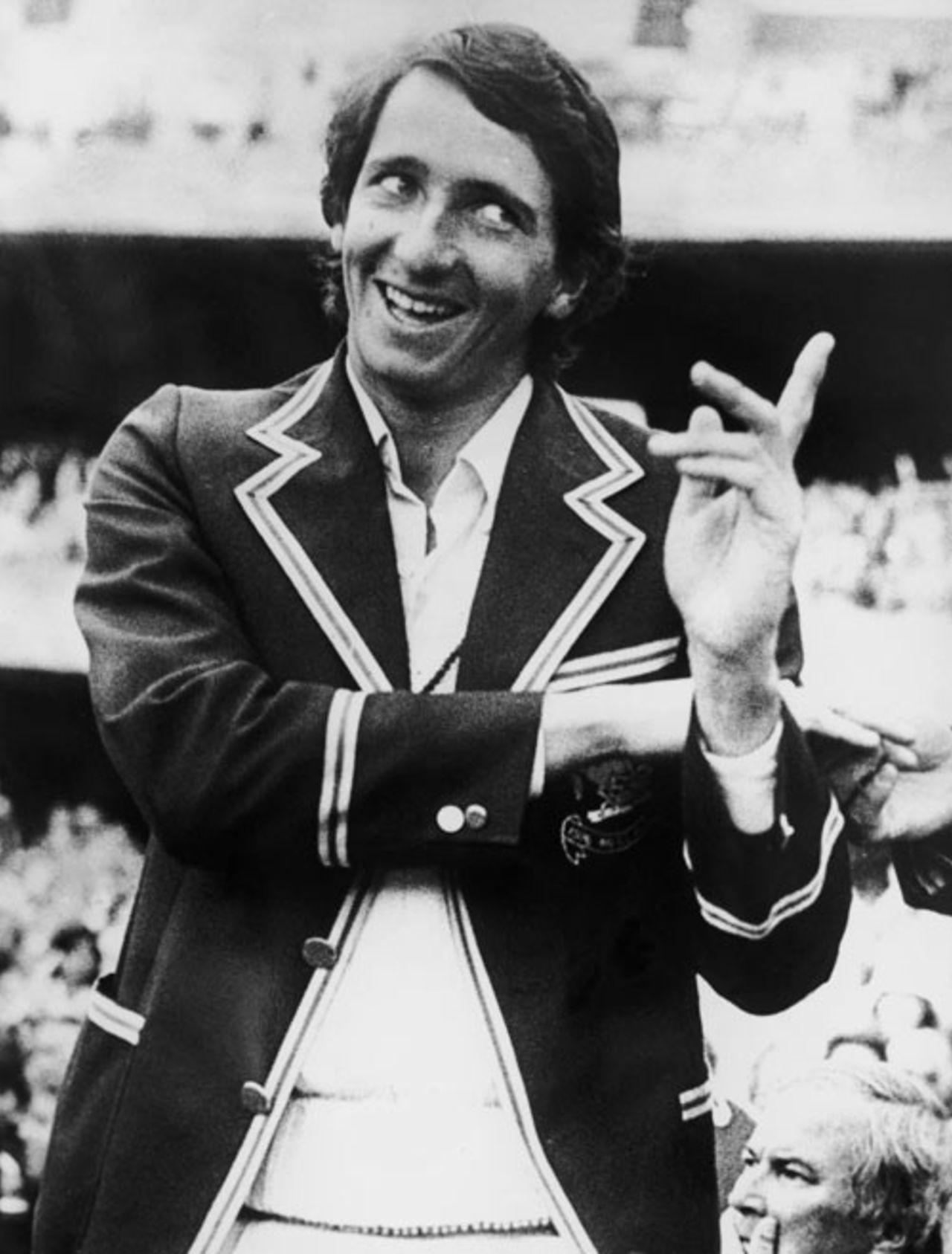 Derek Randall, the Man of the Match during the post-match presentation, enjoys a joke, Australia v England, Centenary Test, MCG, 22 March, 1977