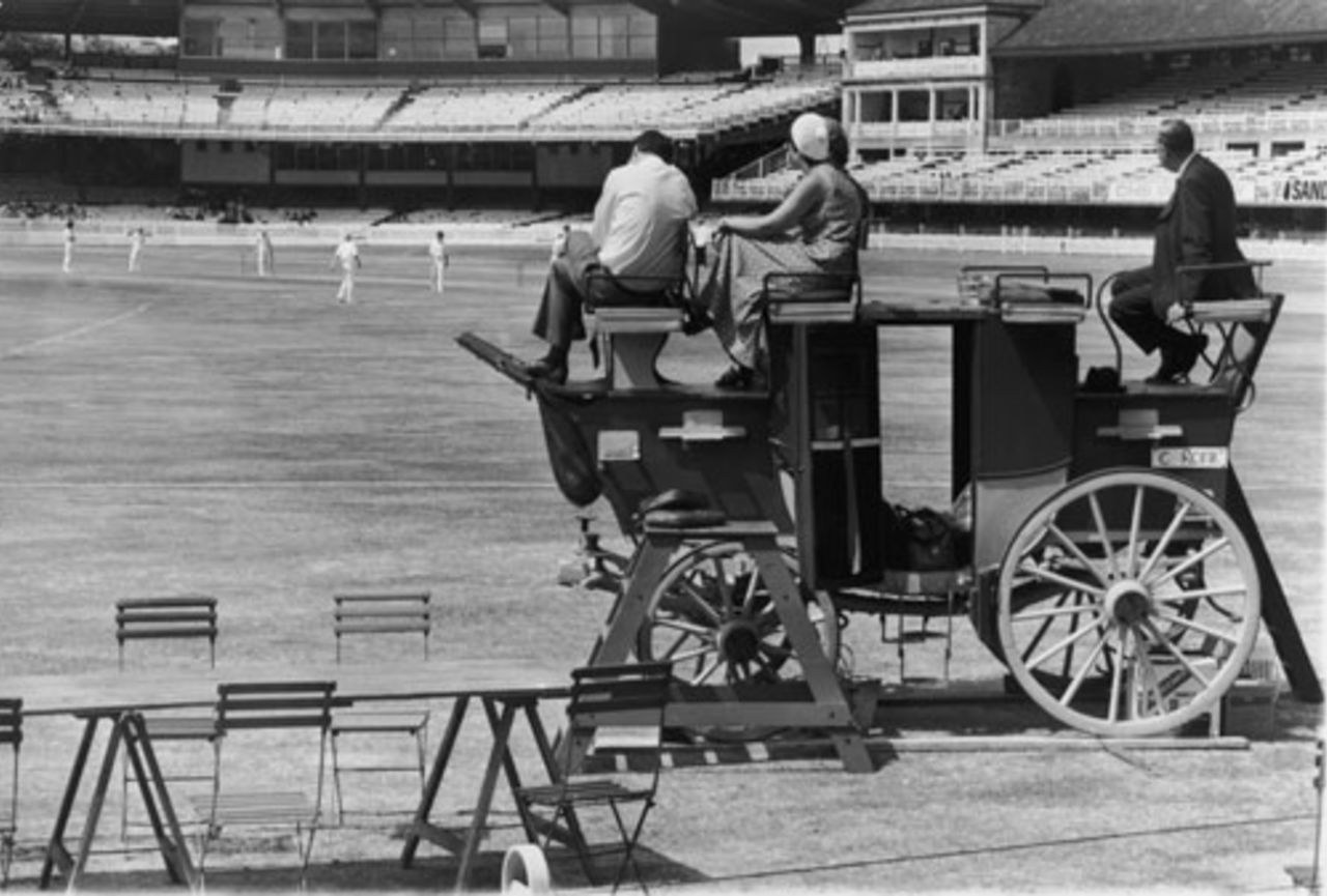 Spectators perch on top of an old stage coach to get a better view of the annual Eton v Harrow match, July 10, 1976