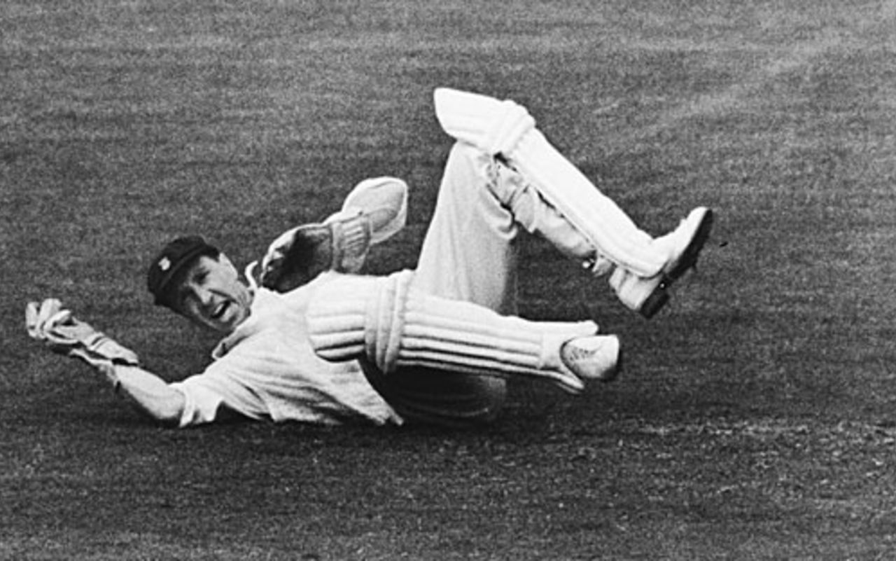 George Dawkes dives for a catch, 1956