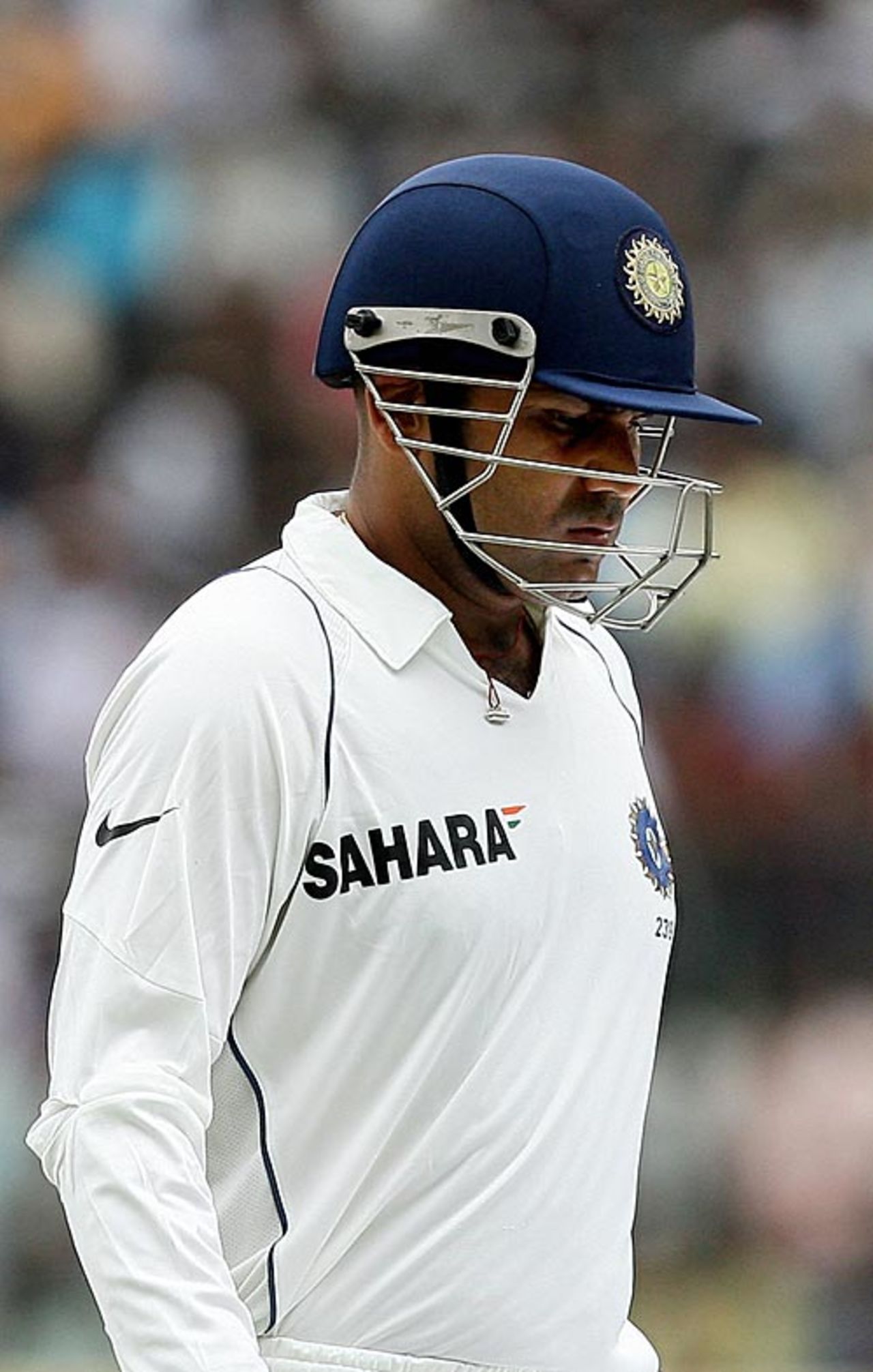 A dejected Virender Sehwag walks back to the pavilion, India v Australia, 1st Test, Bangalore, 5th day, October 13, 2008