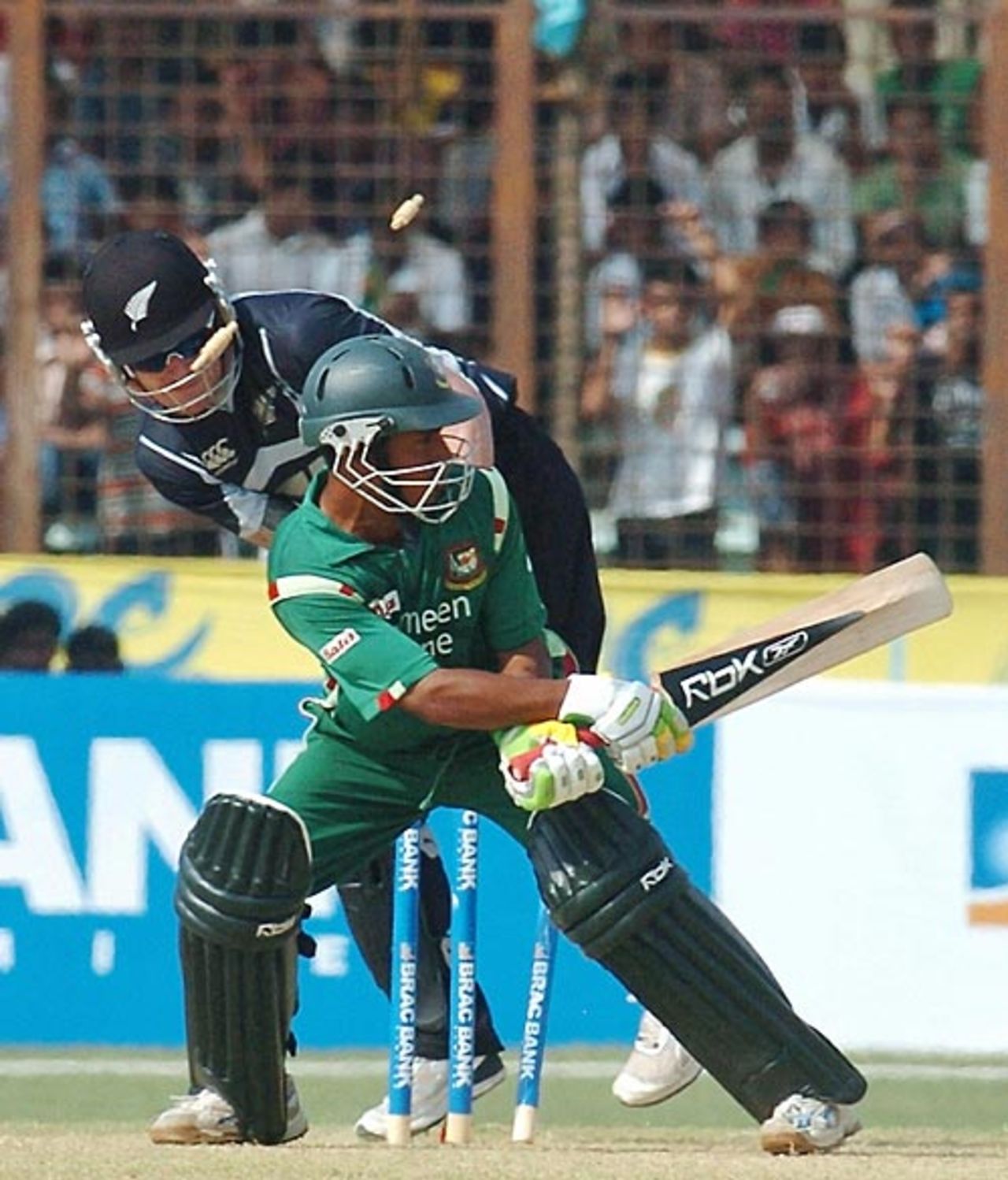 Mohammad Ashraful is cleaned up by Jacob Oram, Bangladesh v New Zealand, 3rd ODI, Chittagong, October 14, 2008