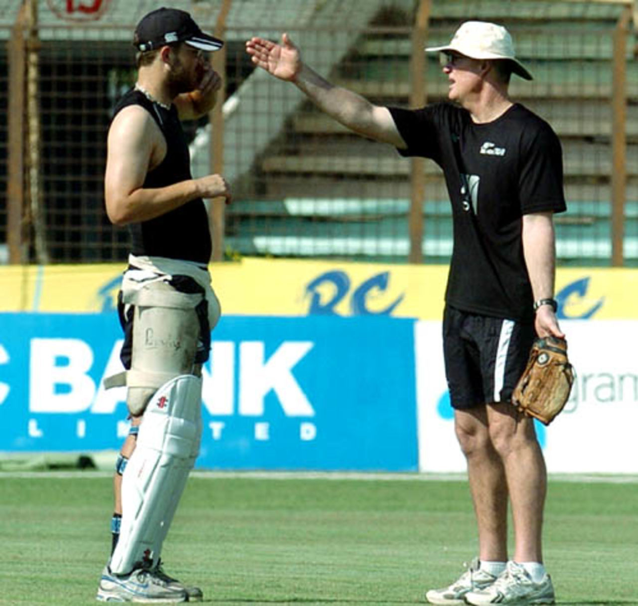 Daniel Vettori listens to advice from coach John Bracewell, Chittagong, October 15, 2008
