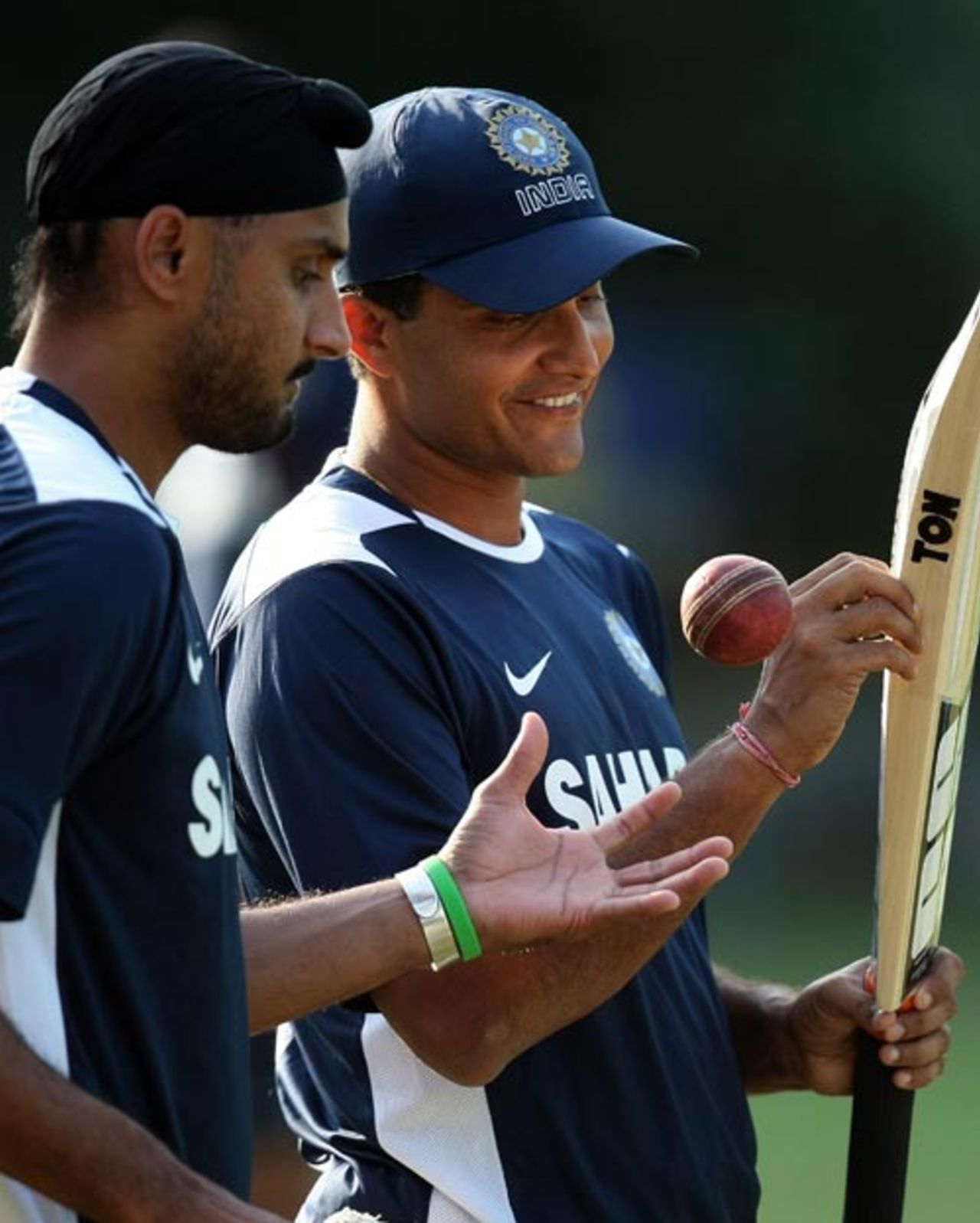 Harbhajan Singh and Sourav Ganguly look relaxed during the nets session, Mohali, October 15, 2008