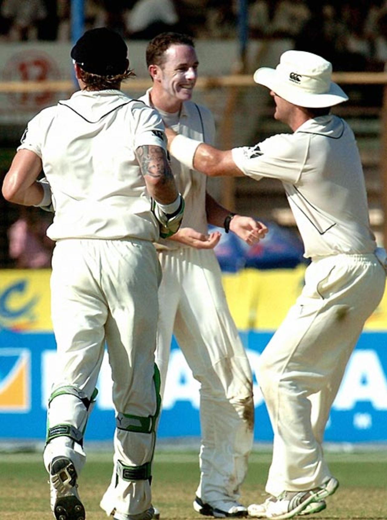 Iain O'Brien is congratulated by team-mates after the fall of Mushfiqur Rahim's wicket, Bangladesh v New Zealand, 1st Test, Chittagong, 3rd day, October 19, 2008