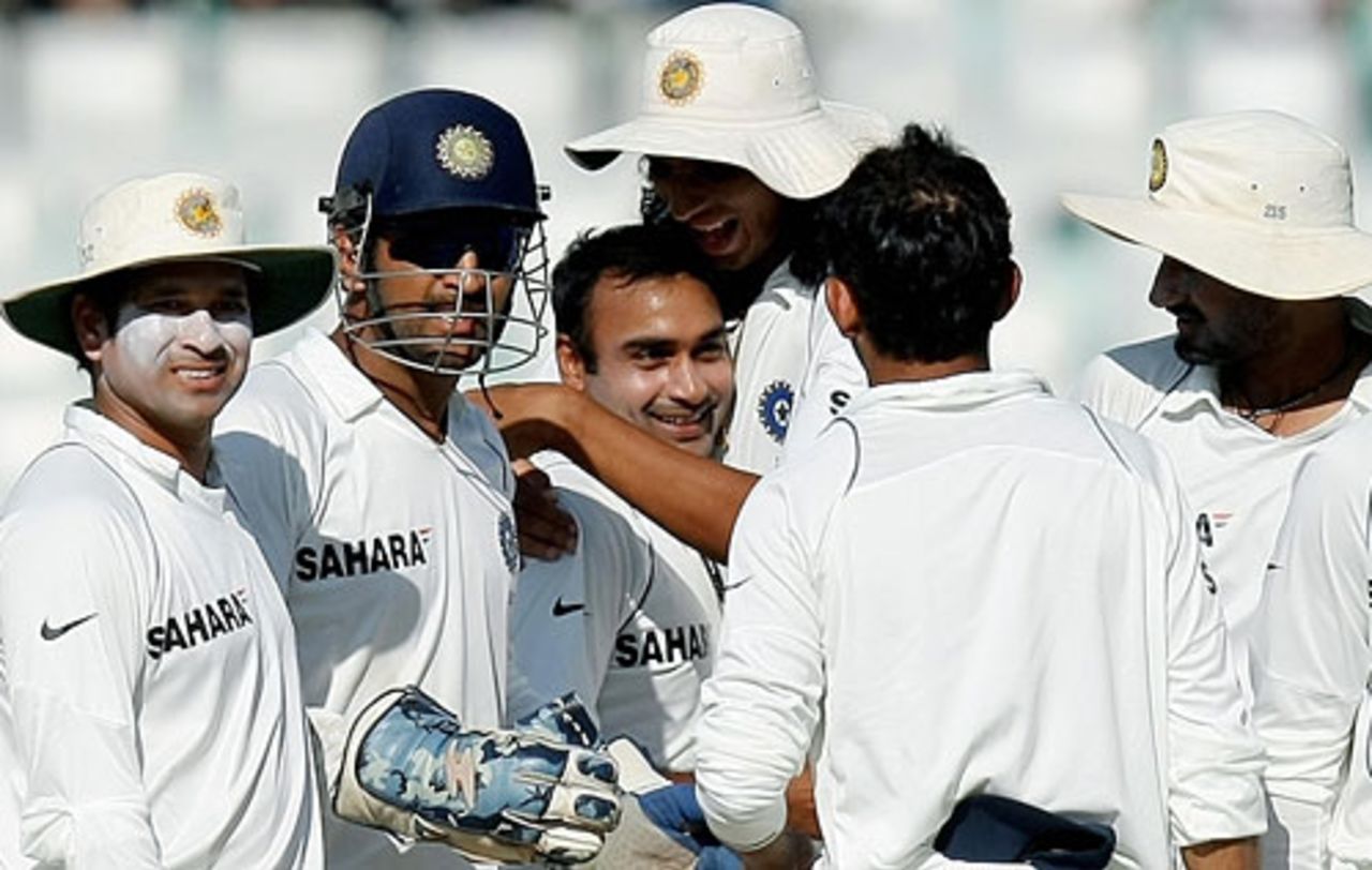 Amit Mishra is mobbed by team-mates after taking 5 for 71 on debut, India v Australia, 2nd Test, Mohali, 3rd day, October 19, 2008