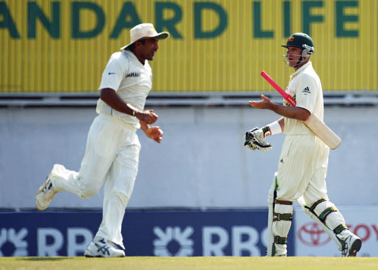 Matthew Hayden is not happy as Zaheer Khan runs past him after his dismissal, 4th day, October 20, 2008