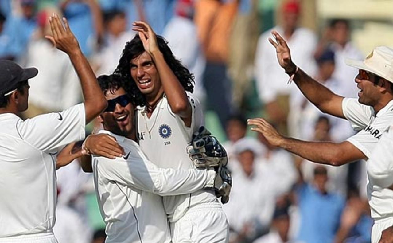 Team-mates congratulate Ishant Sharma after the fall of Shane Watson's wicket, India v Australia, 2nd Test, Mohali, 4th day, October 20, 2008