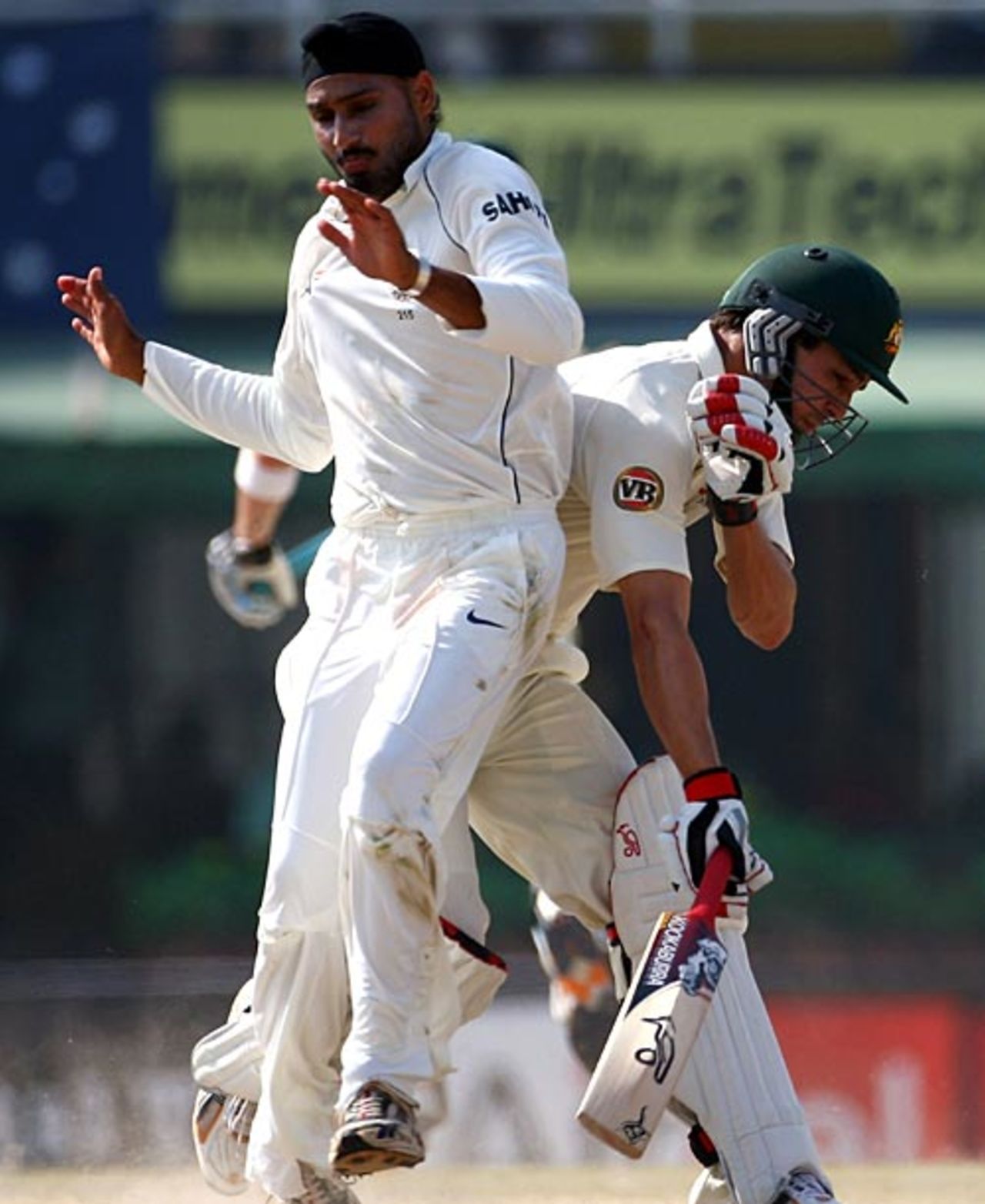 Harbhajan Singh avoids a collision with Mitchell Johnson, India v Australia, 2nd Test, Mohali, 5th day, October 21, 2008