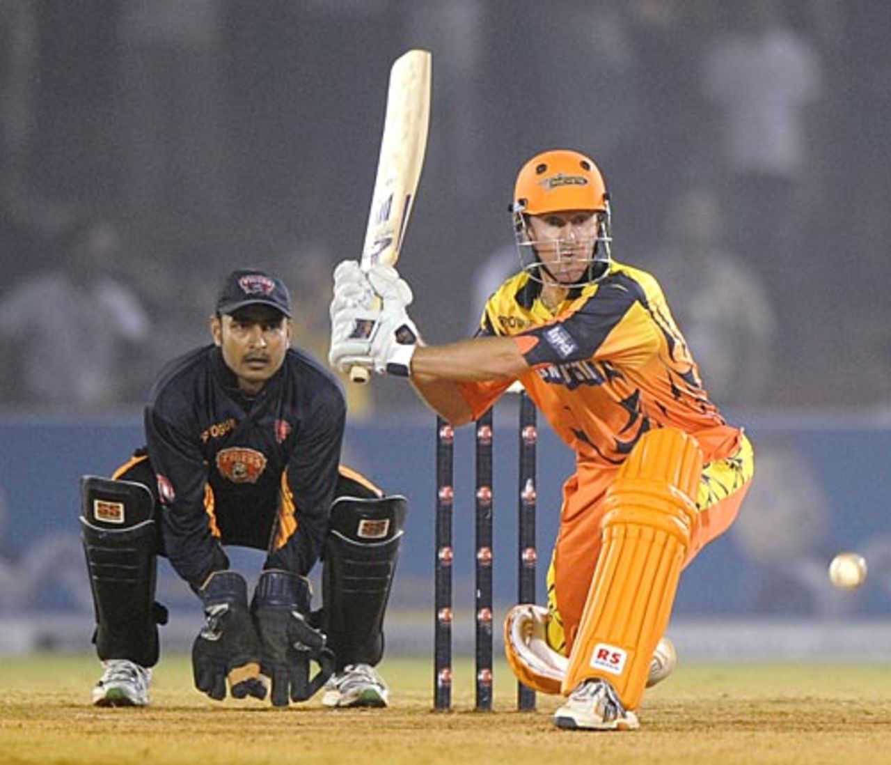 Murray Goodwin gears up for a sweep, Ahmedabad Rockets v Royal Bengal Tigers, Indian Cricket League, 15th match, Ahmedabad, October 22, 2008