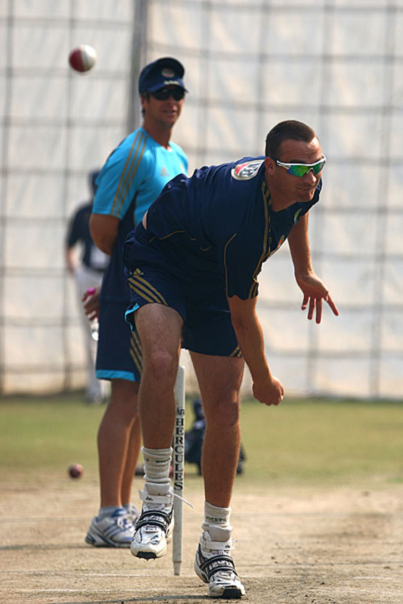 Stuart Clark tests his injured elbow at the nets, New Delhi, October 25, 2008