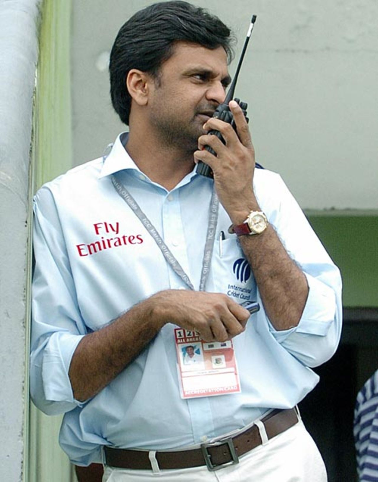 Javagal Srinath, the match referee, talks on his walkie talkie, Bangladesh v New Zealand, 2nd Test, Mirpur, 3rd day, October 27, 2008