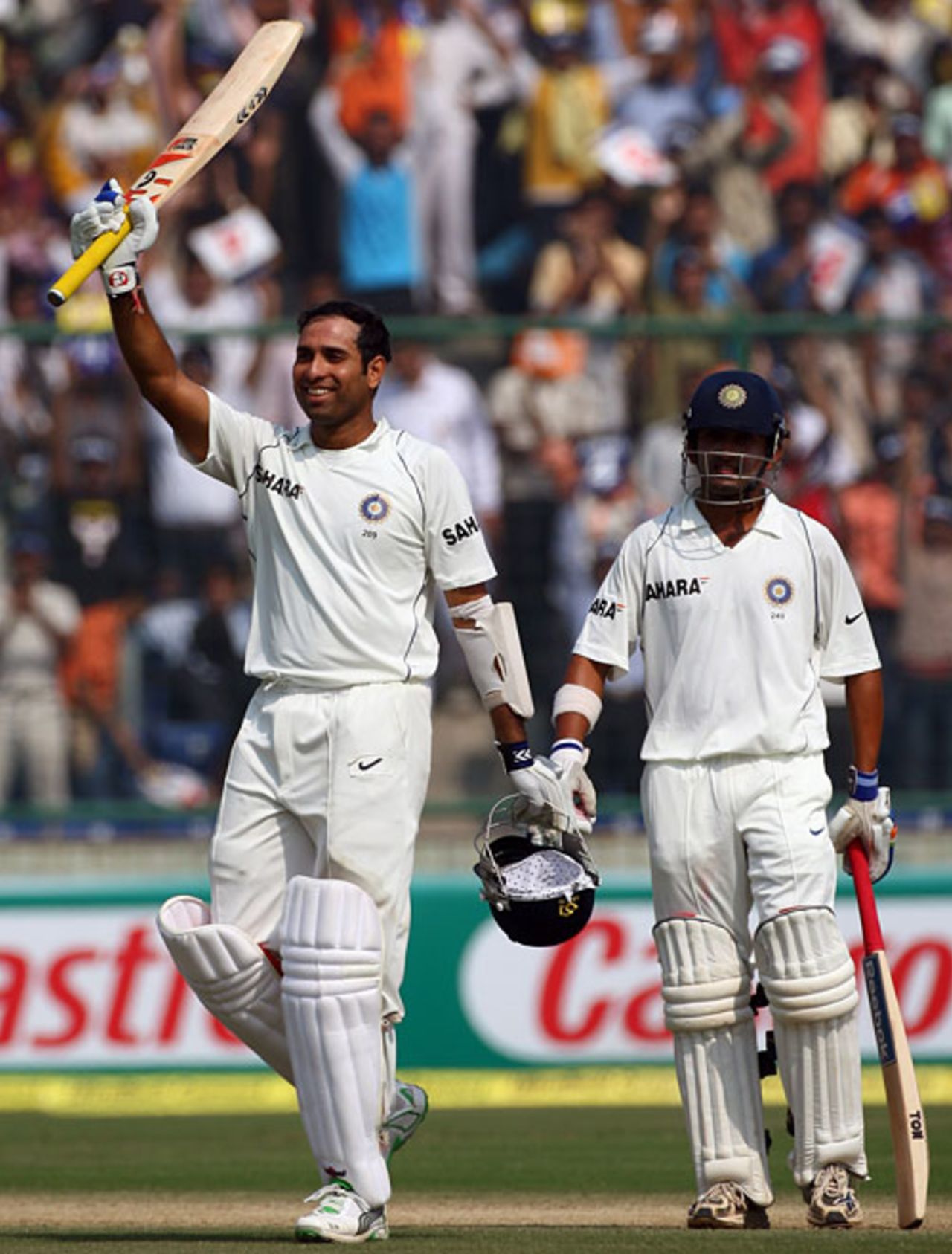 VVS Laxman acknowledges the applause after reaching his century as Gautam Gambhir looks on, India v Australia, 3rd Test, Delhi, 2nd day, October 30, 2008
