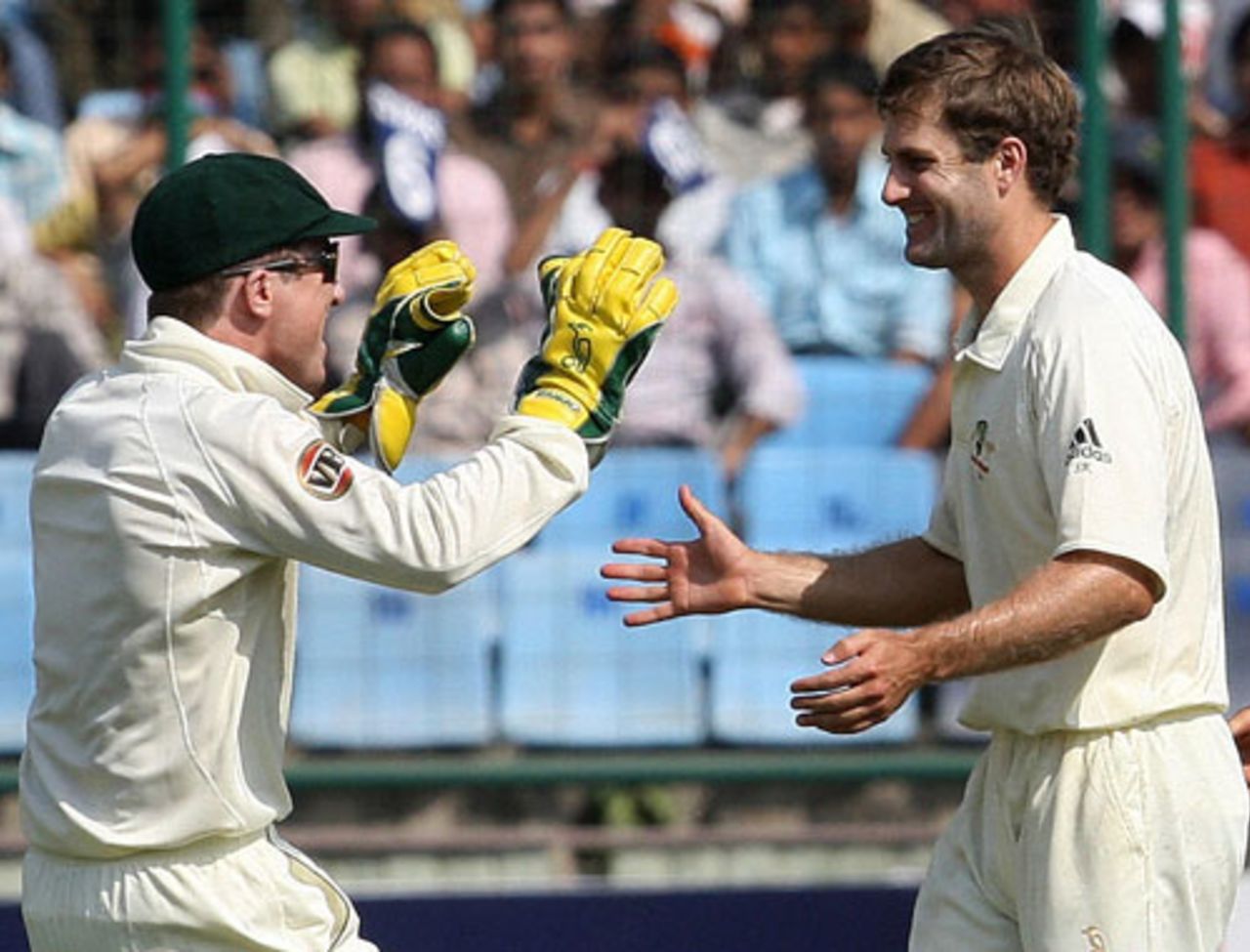 Brad Haddin and Simon Katich celebrate Sourav Ganguly's wicket, India v Australia, 3rd Test, Delhi, 2nd day, October 30, 2008