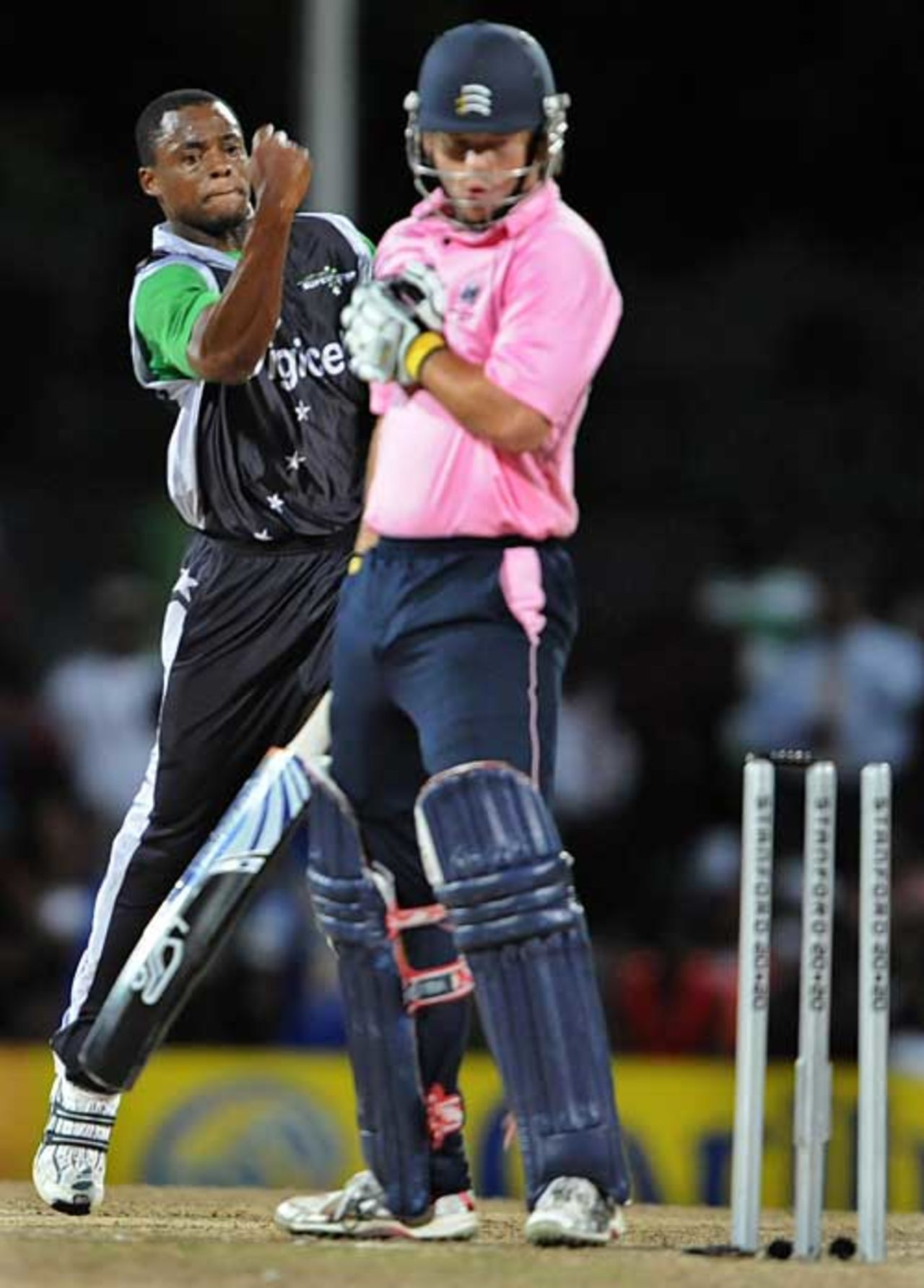 Ed Joyce is bowled off his body by Daren Powell, Stanford Superstars v Middlesex, Antigua, October 30, 2008