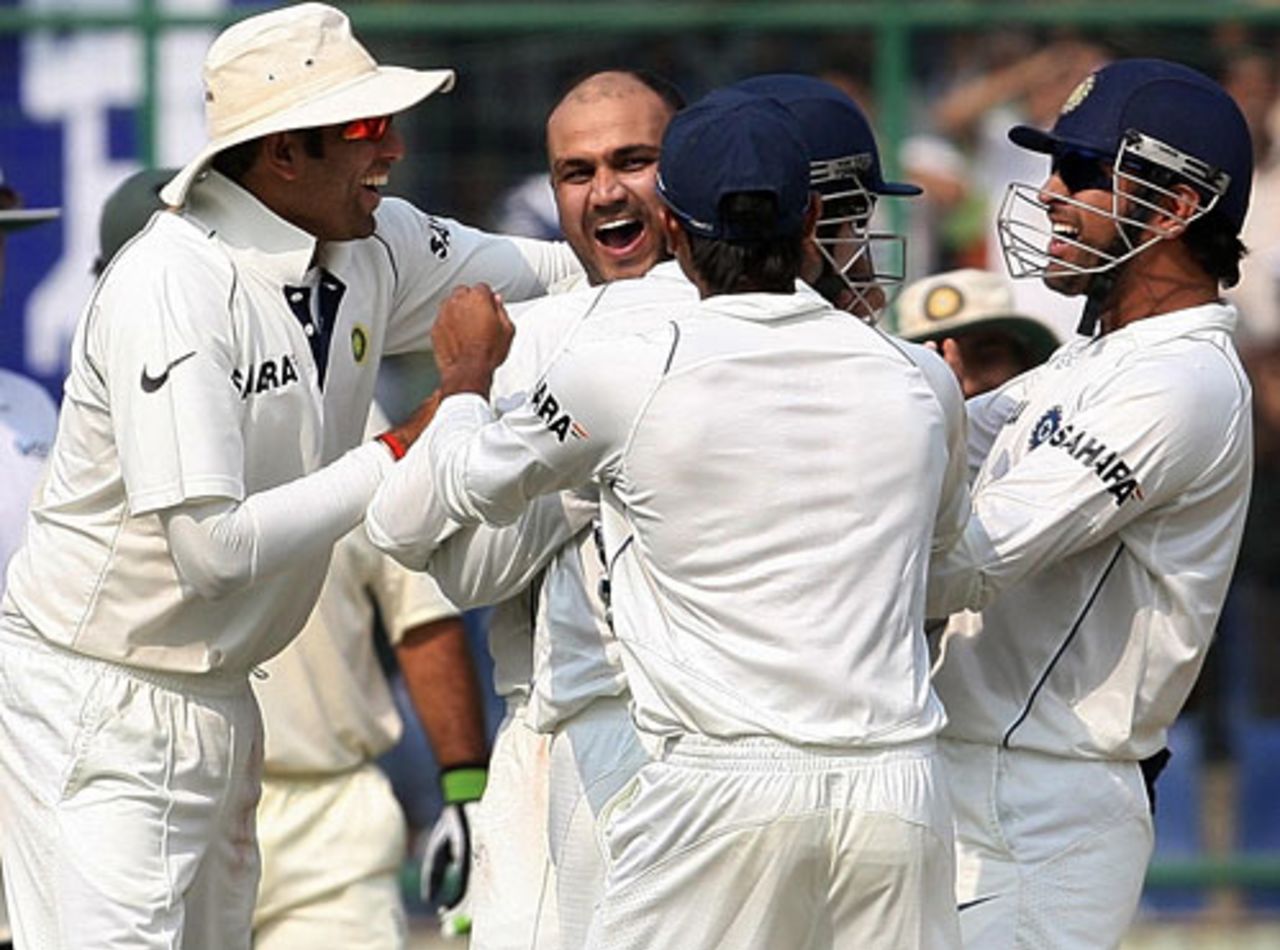 Virender Sehwag is congratulated by his team-mates after dismissing Matthew Hayden, India v Australia, 3rd Test, Delhi, 3rd day, October 31, 2008
