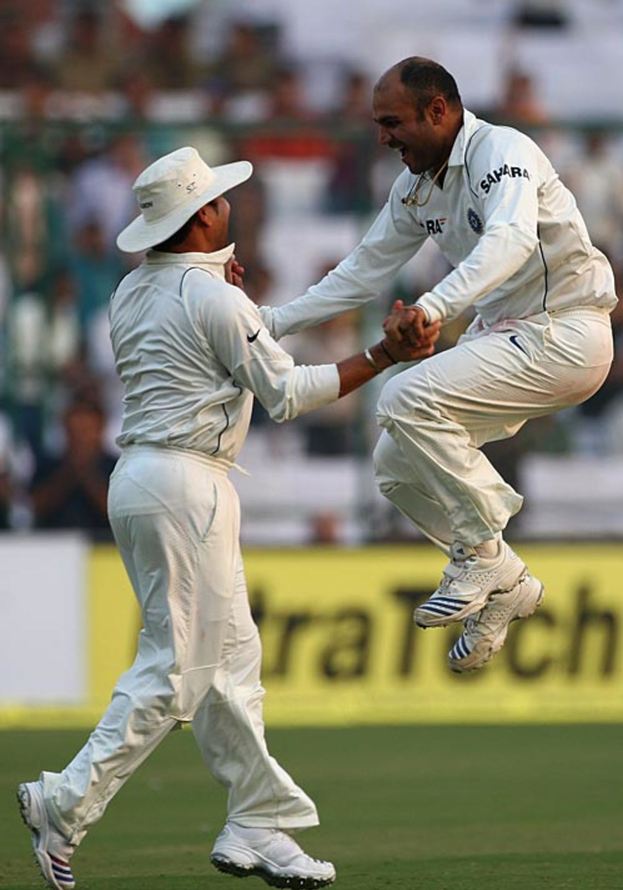 Virender Sehwag leaps for joy after taking Michael Hussey's wicket, India v Australia, 3rd Test, Delhi, 3rd day, October 31, 2008