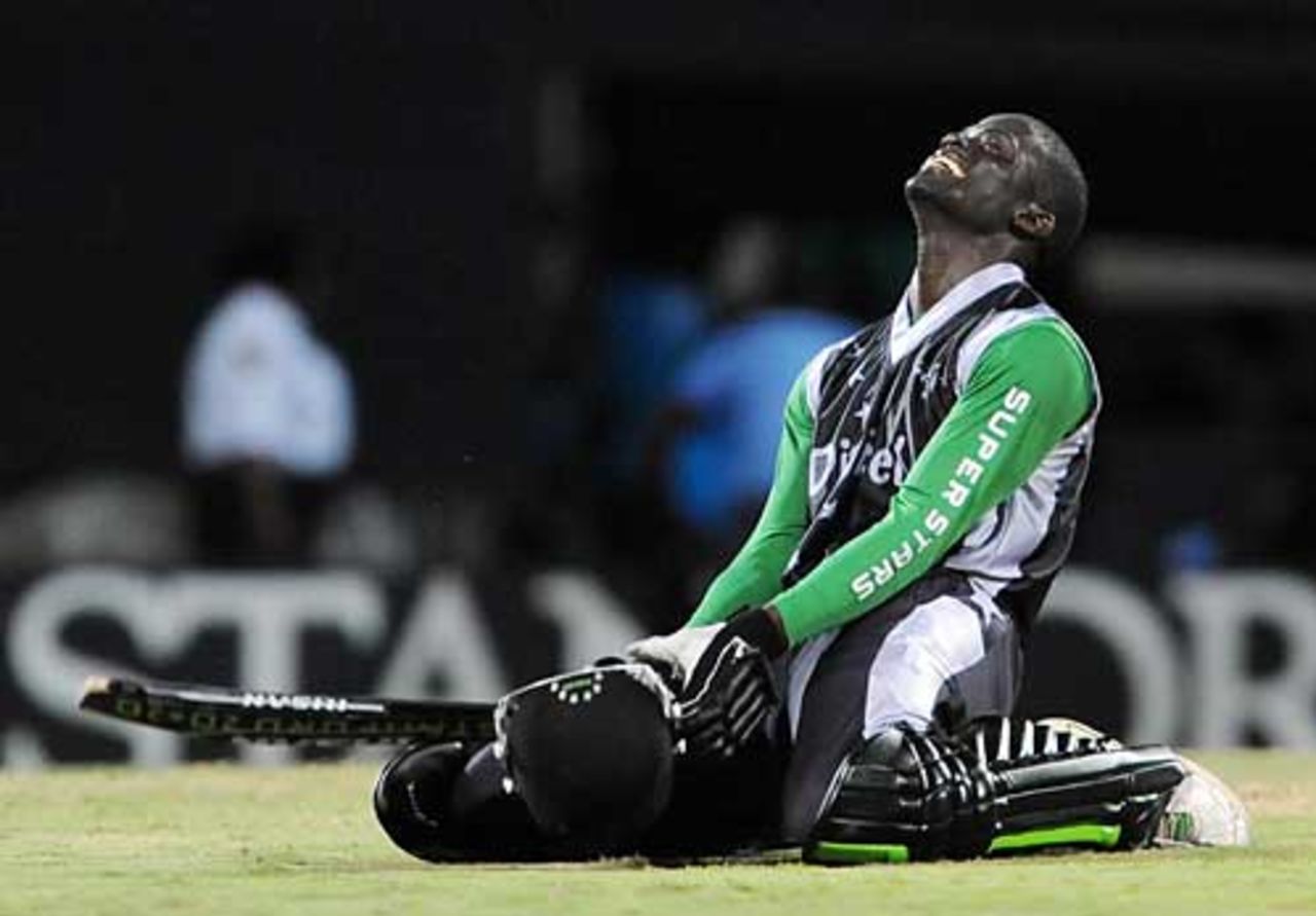 Andre Fletcher goes down on his knees as the win his secured, Superstars v England, Antigua, November 1, 2008