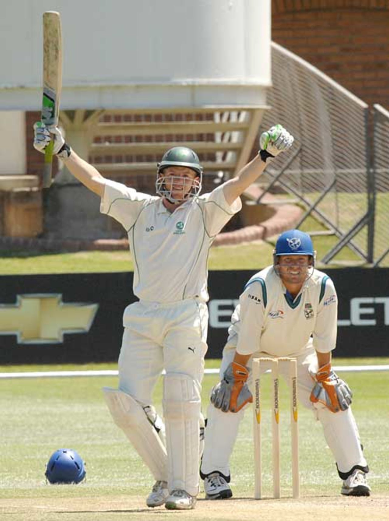 Niall O'Brien raises his arms in triumph as he passes three figures, Intercontinental Cup final, Port Elizabeth, November 2, 2008