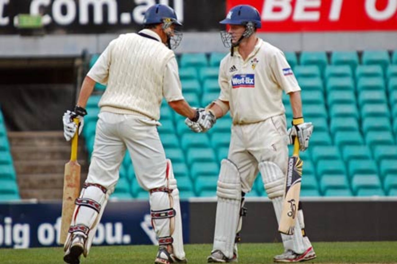 David Hussey congratulates Chris Rogers on his 150, New South Wales v Victoria, Sheffield Shield, Sydney, November 5, 2008